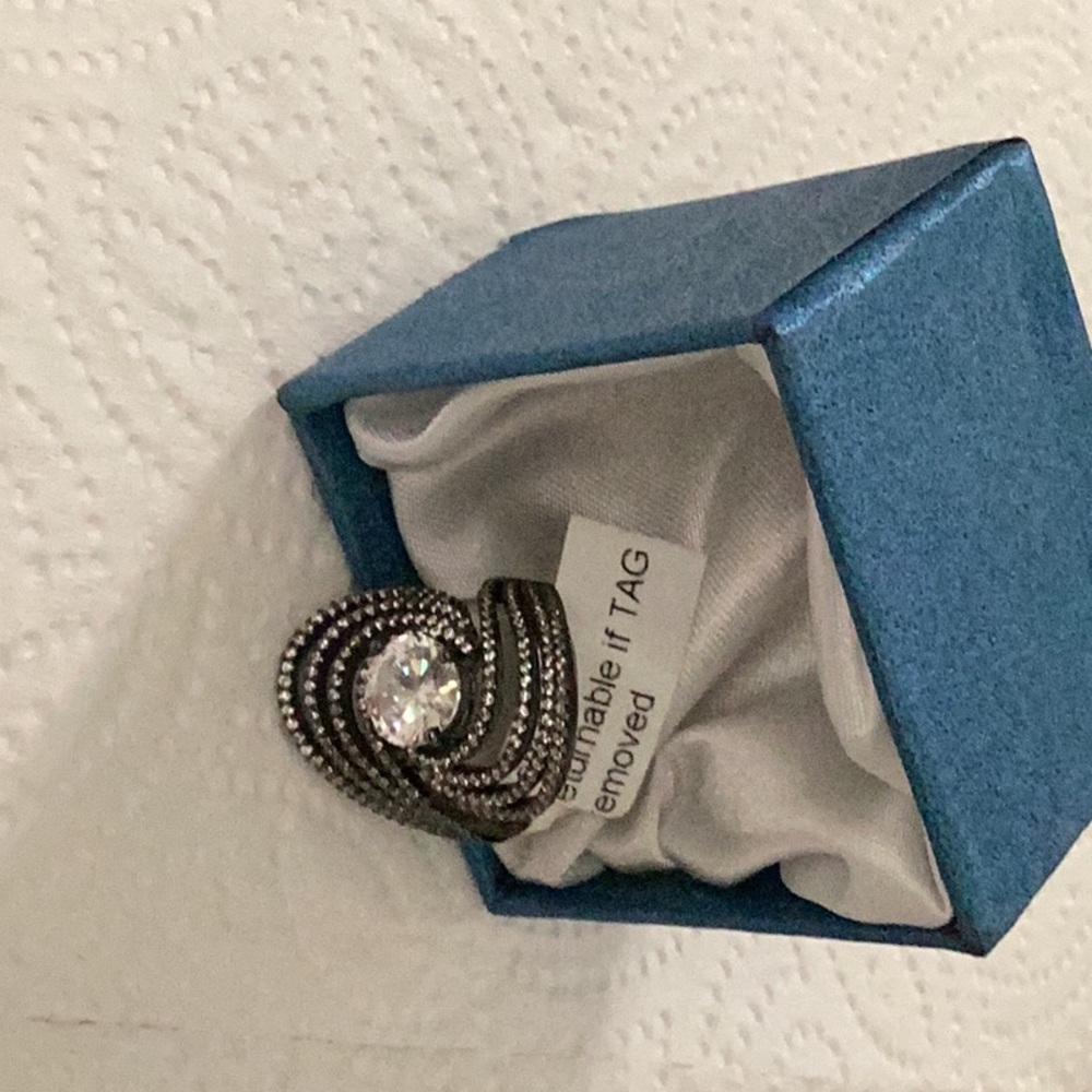 Elegant Silver-Tone Ring with Clear Gemstone